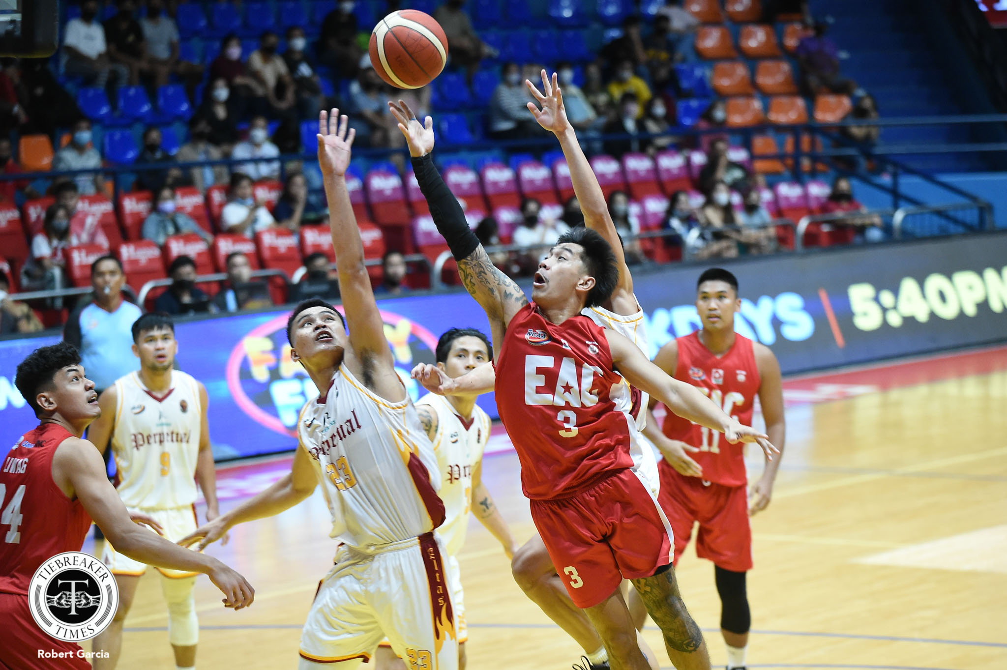 NCAA-98-UPHSD-vs-EAC-Kriss-Gurtiza EAC suspends Ralph Robin, Kriss Gurtiza for rest of season Basketball EAC NCAA News - philippine sports news