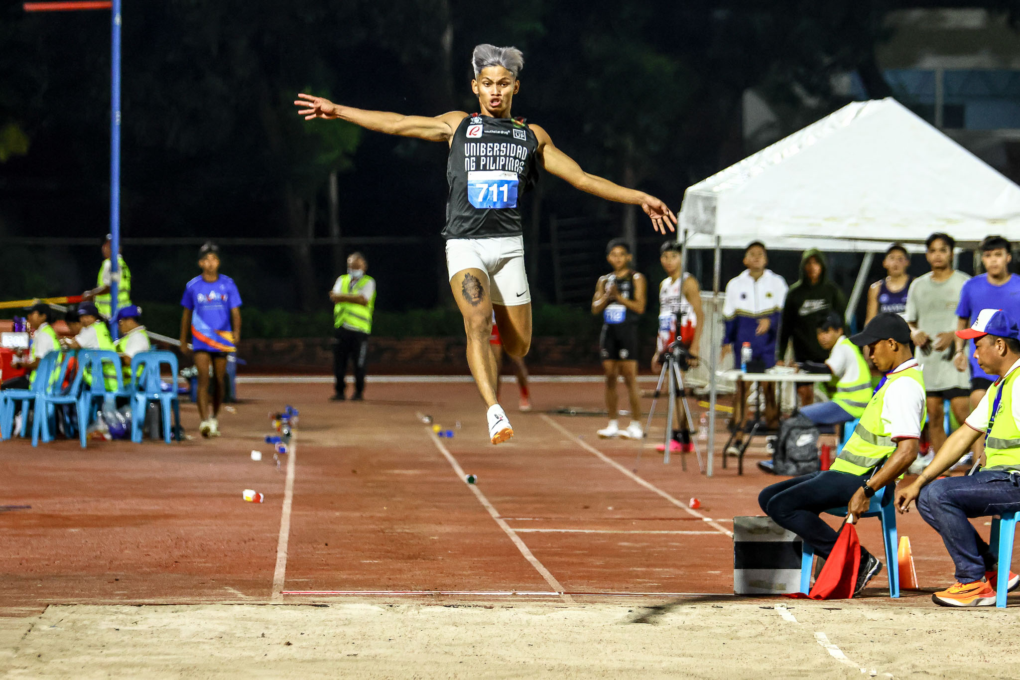 UAAP-86-Athletics-Championship-Day-2-Clint-Neri UAAP 86 Athletics: UP surges to men's lead after Alhryan Labita's record-breaker in 200m ADMU AdU DLSU FEU News NU Track & Field UAAP UE UP UST - philippine sports news
