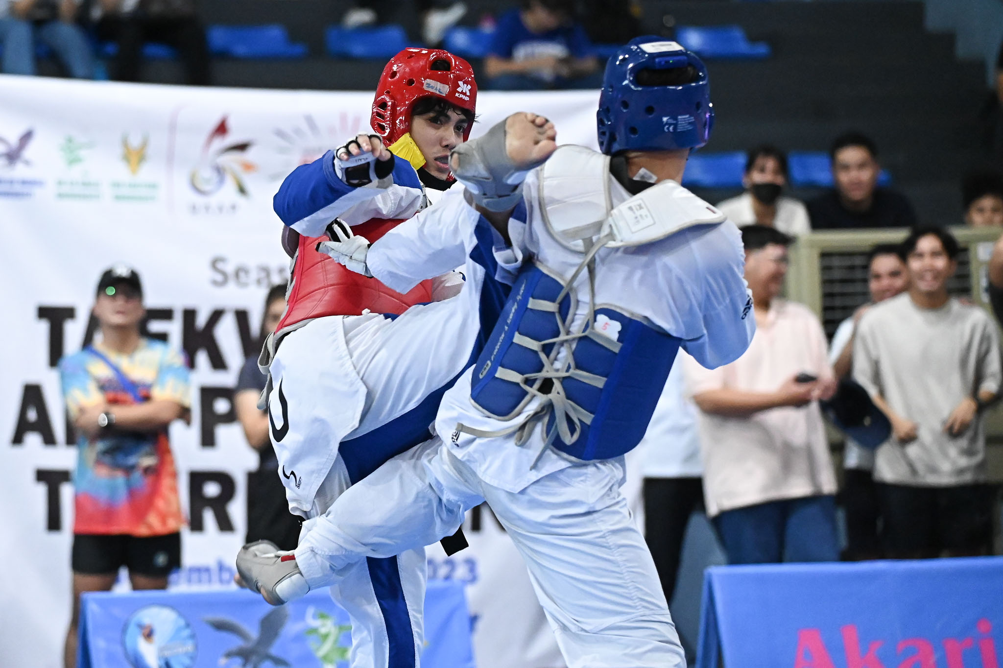 UAAP-86-Kyorugi-Nusair-Lao-3 Barbosa-less NU conquers UST, secures UAAP Men's TKD five-peat ADMU DLSU FEU News NU Taekwondo UAAP UP UST - philippine sports news