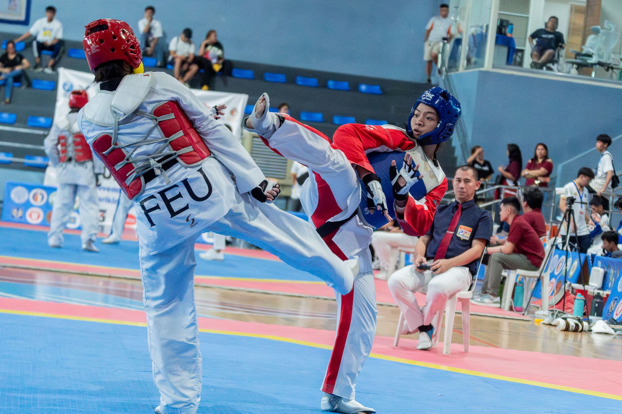 UAAP-86-Kyorugi-Reign-Ragutana-UST-5 UAAP 86 Taekwondo: Sturdy Gilbuena steps up for Kurt Barbosa, leads NU to 3-0 start ADMU DLSU FEU News NU Taekwondo UAAP UP UST - philippine sports news