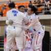 UE Men's Fencing team celebrates a win during the UAAP 86 Fencing tournament