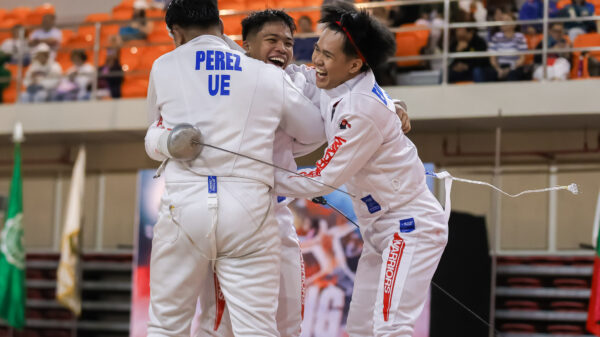 UE Men's Fencing team celebrates a win during the UAAP 86 Fencing tournament