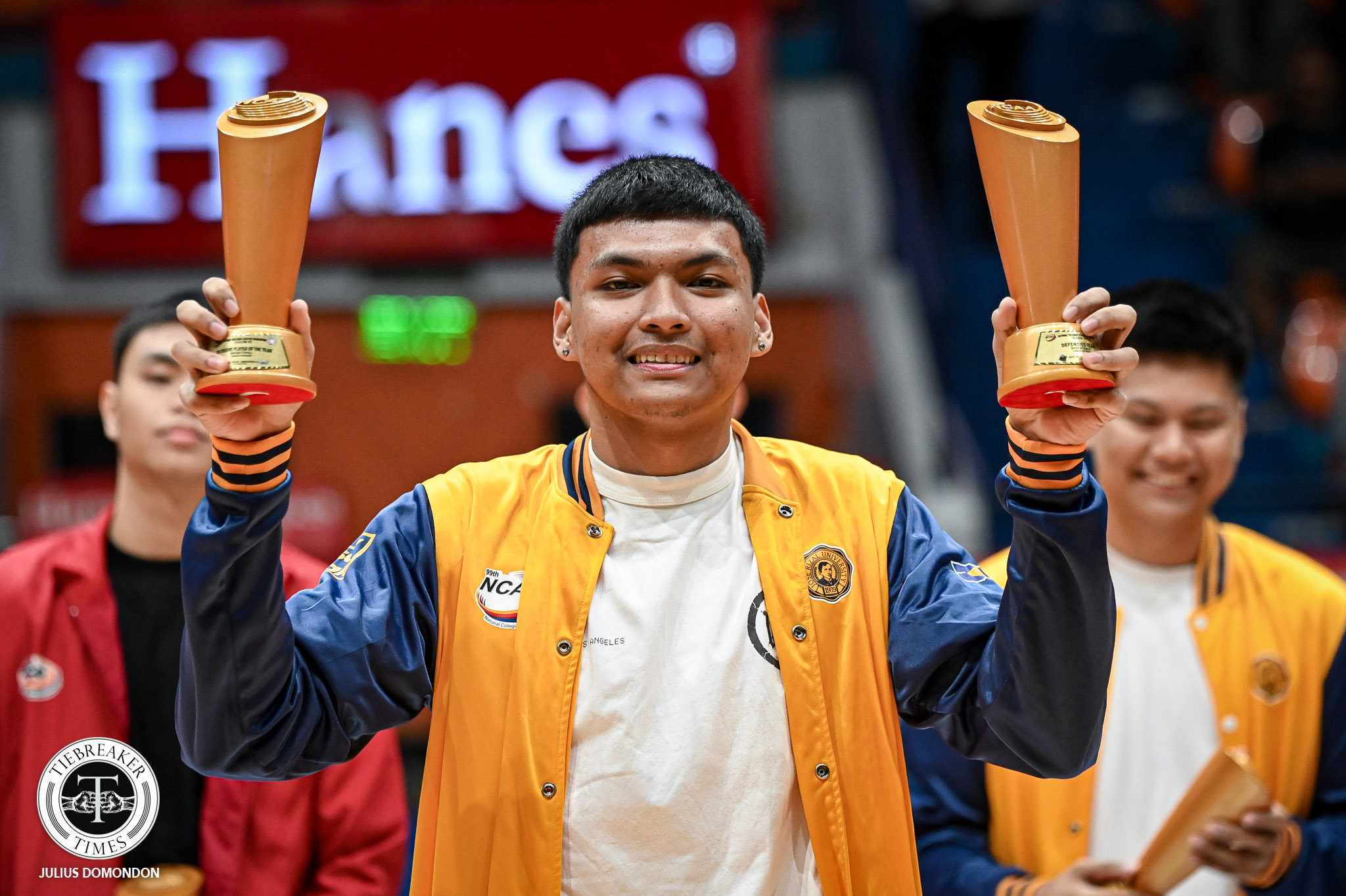 NCAA99-DEFENSIVE-PLAYER-OF-THE-YEAR-PAUL-ENAL-7886 Perpetual pride Amiel Acido becomes first Altas player to win NCAA Jrs MVP Basketball CSJL EAC JRU NCAA News UPHSD - philippine sports news