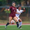 Jennifer Baroin (UP) and Angely Alferez (Ateneo) fight for the ball in the UAAP S86 Women's Football game