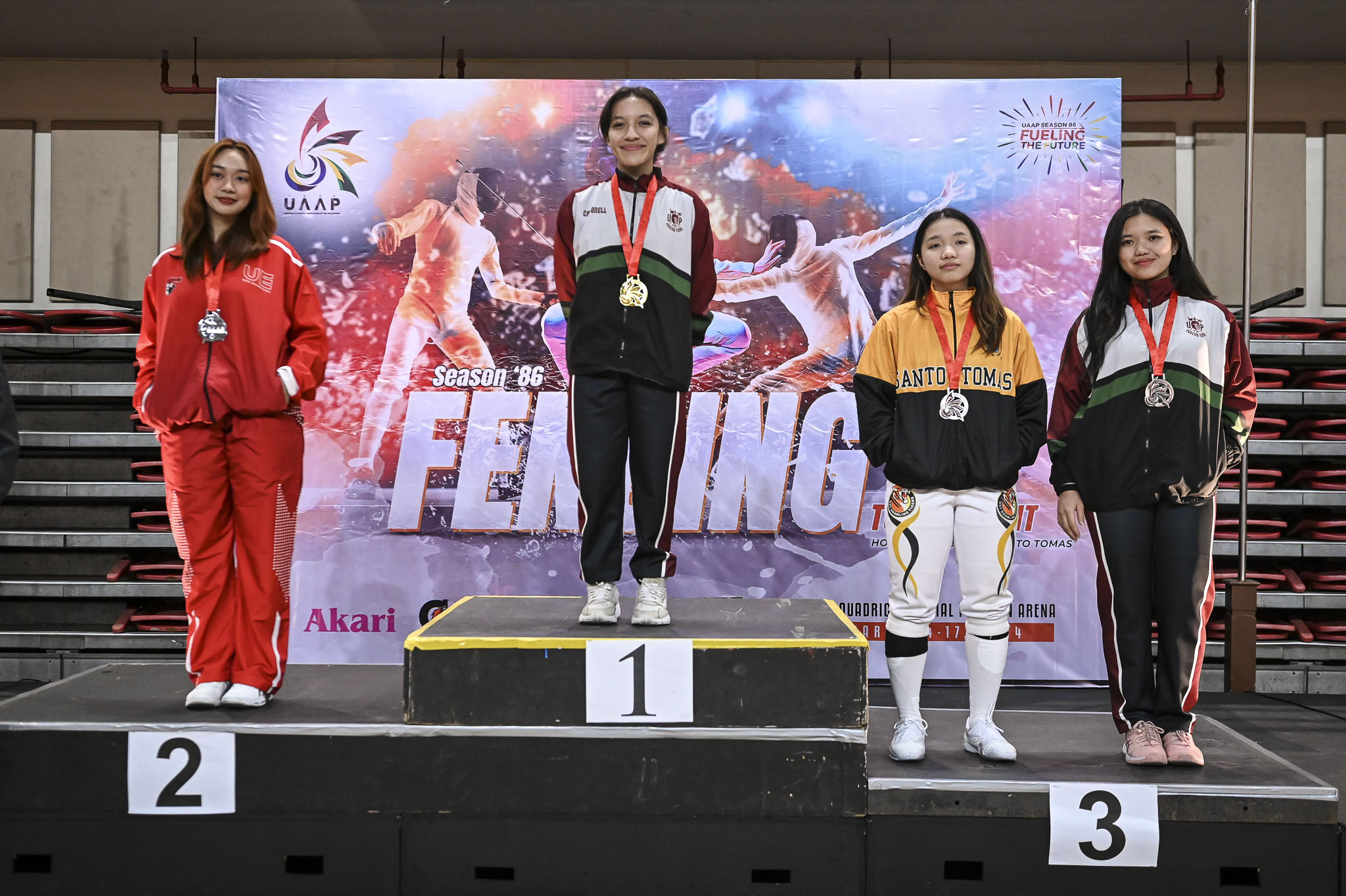UAAP86-Fencing-Womens-Foil-2-Eytria-Olarte-UE-1-Marina-Andrea-Carbonell-UST-3-Janna-Allysah-Catantan-UST-Nami-Noro-UP-7656 UAAP 86 Fencing: Eunice Villanueva retains sabre title, puts UST in men's lead ADMU DLSU Fencing News UAAP UE UP UST - philippine sports news