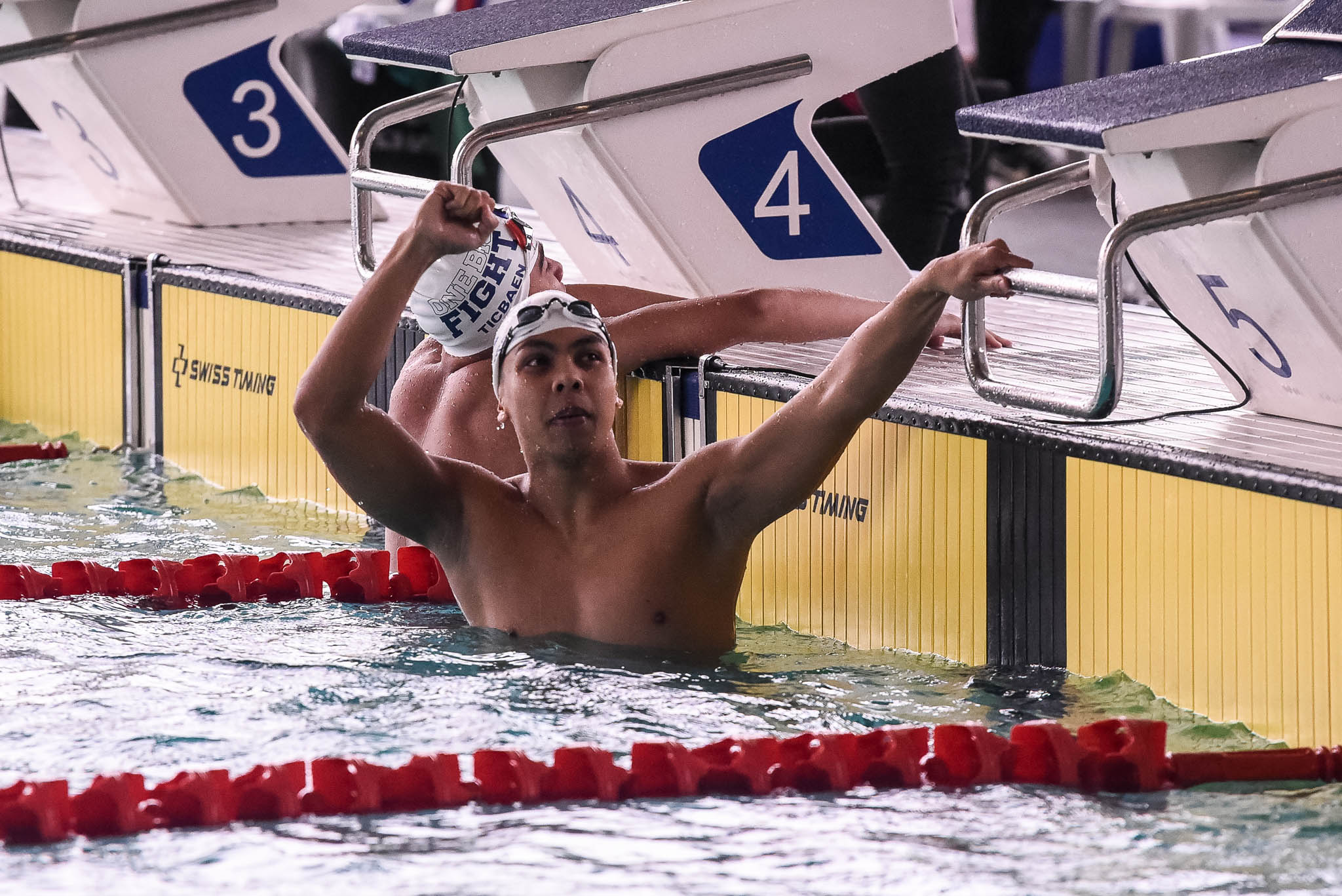 UAAP-S87-Swimming-Mens-100m-Freestyle-Ateneo-Barreto-Rafael-1945 New Clark City lights up again as UAAP Swimming, Athletics Championships kick off ADMU AdU DLSU FEU News NU Swimming Track & Field UAAP UE UP UST - philippine sports news