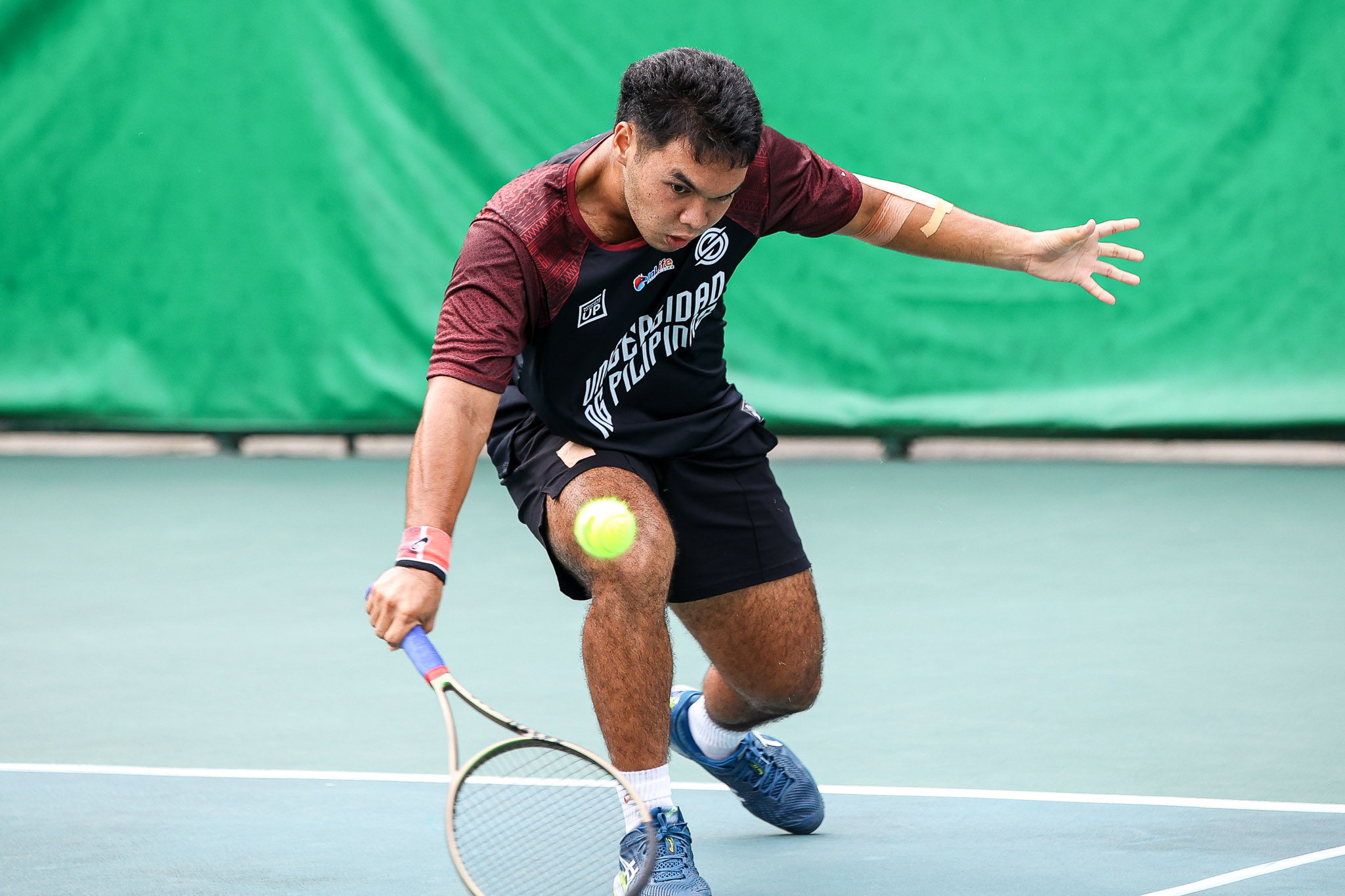 UAAP-87-MENS-TENNIS-MIGUEL-IGLUPAS-2286 UE outlasts Ateneo, takes solo second in UAAP Men's Tennis ADMU AdU News Tennis UAAP UE UP - philippine sports news