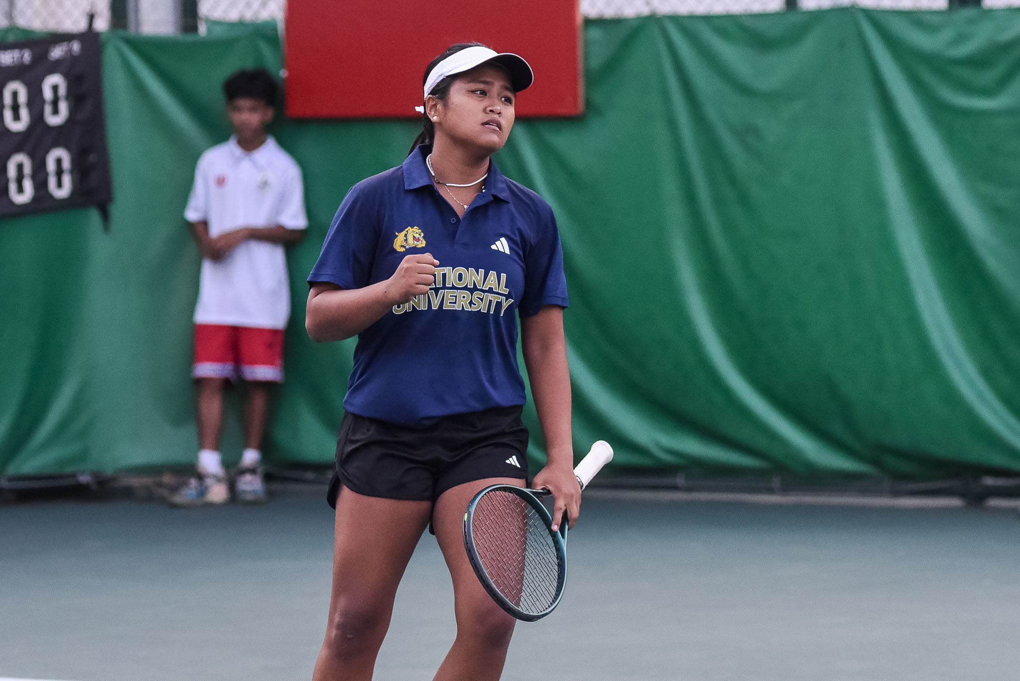 UAAPS87-Tennis-Womens-Finals-Danna-ABAD-PAT_0313 UST levels UAAP women's tennis finals behind Emana sis, doubles heroics News NU Tennis UAAP UST - philippine sports news