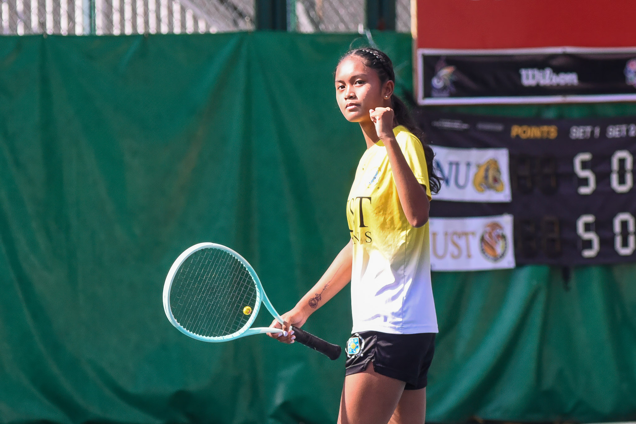 UAAPS87-Tennis-Womens-Finals-Mica-EMANA-0399 UST levels UAAP women's tennis finals behind Emana sis, doubles heroics News NU Tennis UAAP UST - philippine sports news