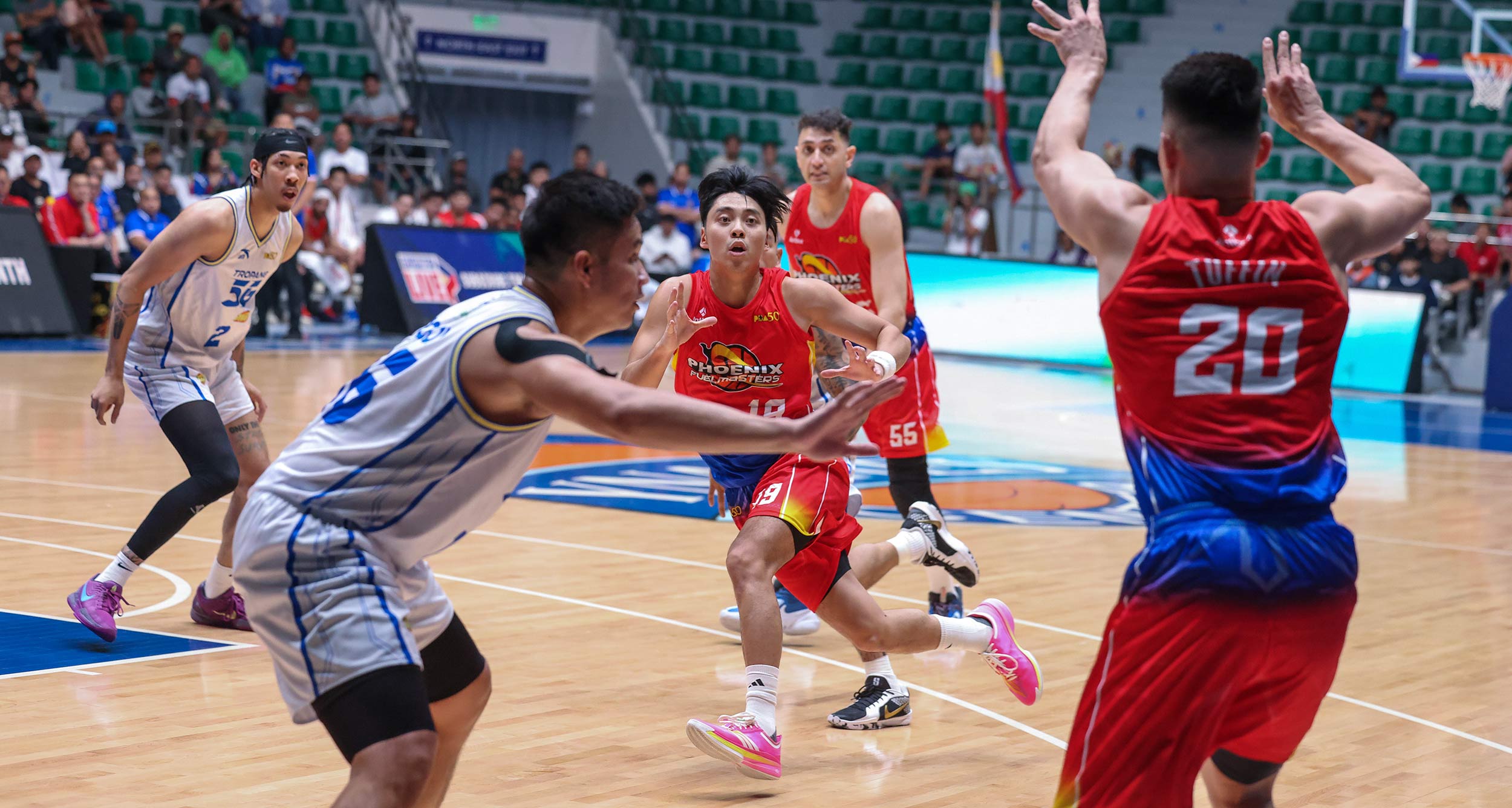 2025-26-PBA-Philippine-Cup-Phoenix-vs-TNT-Tyler-Tio Kevin Ferrer repays TNT’s trust as Tropang 5G blast Phoenix in PBA opener Basketball News PBA - philippine sports news
