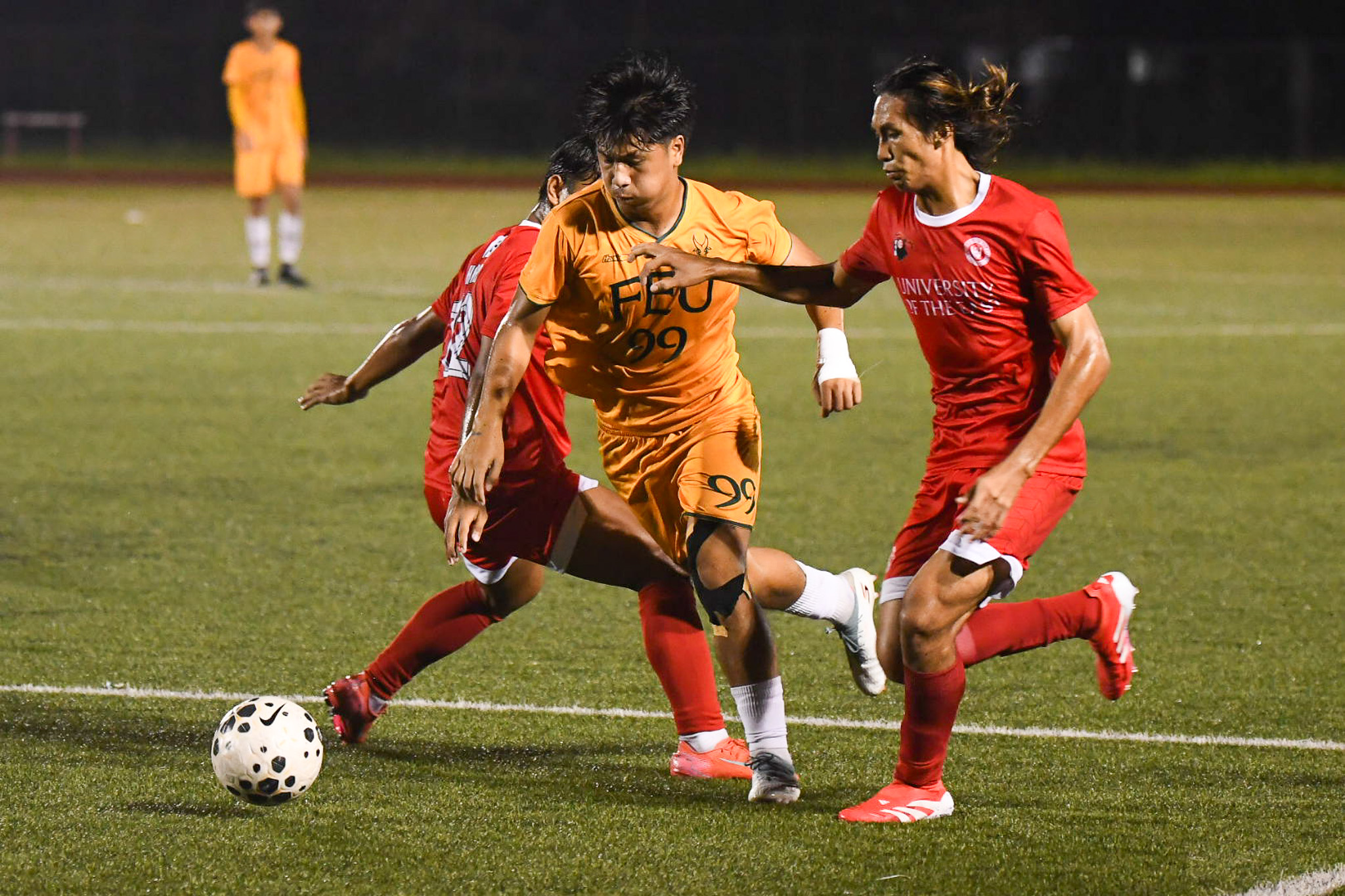 UAAP-Season-88-Men_s-Football-FEU-vs-UE-Theo-Libarnes Mamon’s hat trick lifts FEU past 10-man UE, back to 2nd in UAAP Men's Football FEU Football News UAAP UE - philippine sports news