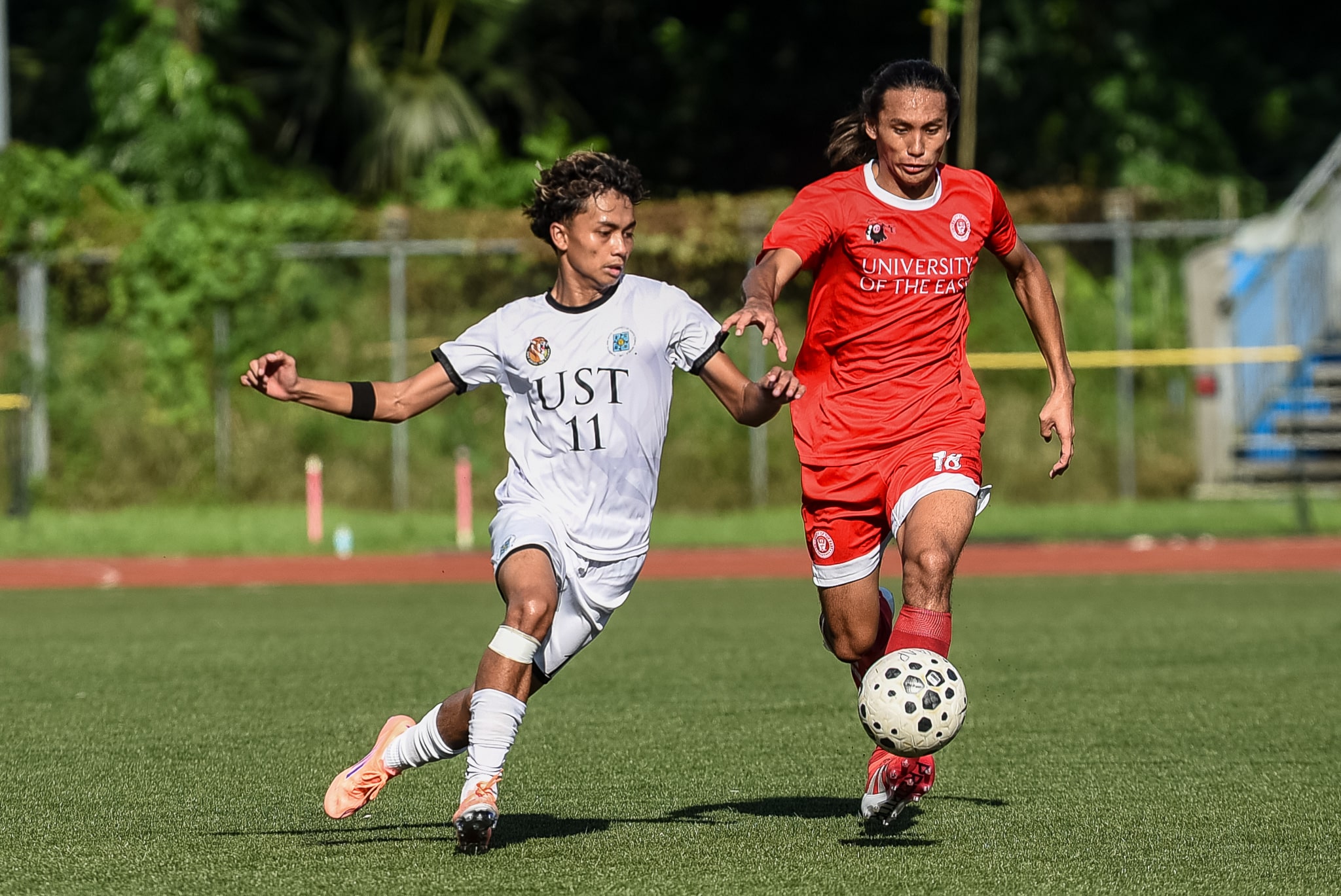 UAAP-Season-88-Men_s-Football-ELOPRE-Kristien-Gabriel-HERMOSO-Keith-3194-min UST edges 10-man UE to strengthen UAAP Men's Football Final Four bid Football News UAAP UE UST - philippine sports news