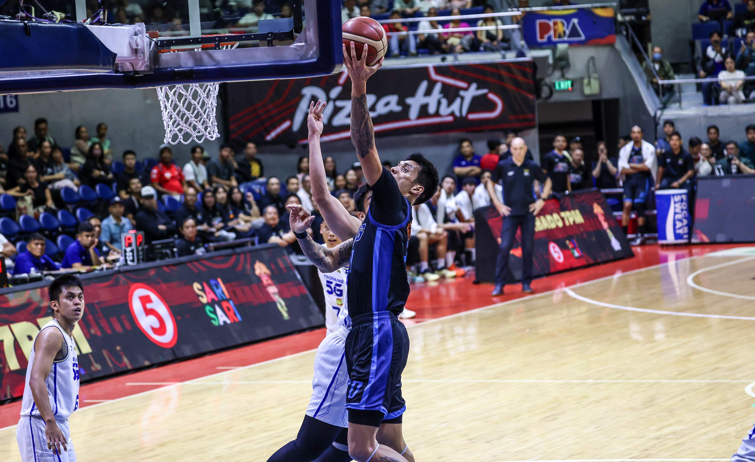 2025-26-PBA-Philippine-Cup-Semis-Game-1-TNT-vs-Meralco-Raymond-Almazan TNT rallies behind Oftana to take PBA Semis Game 1 lead against Meralco Basketball News PBA - philippine sports news