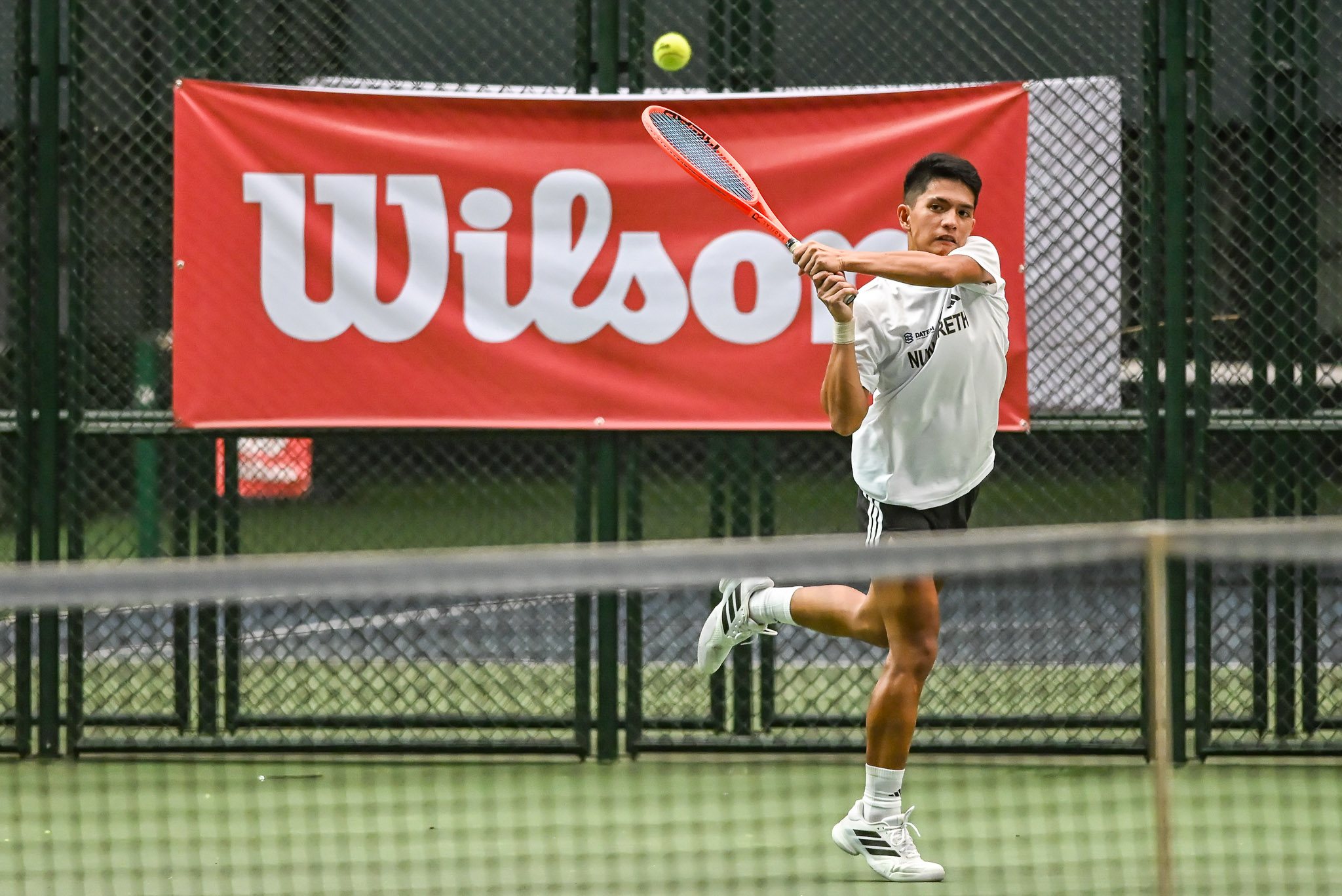 UAAP-88-HS-Tennis-Ariel-Cabaral-7828 Ateneo's Miguel Lagac leads quarters cast in UAAP Boys Tennis ADMU DLSU News NU Tennis UAAP UE UST - philippine sports news