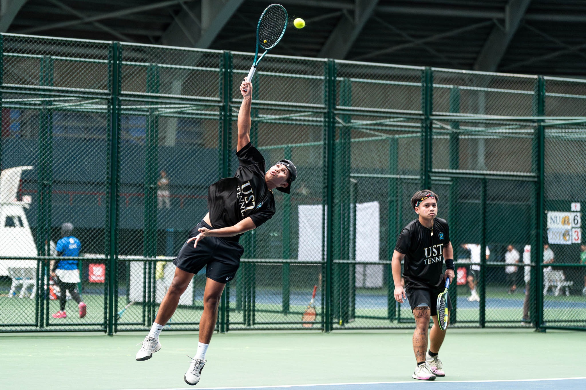 UAAP-S88-Lawn-Tennis-Bautista-Agustines-02031 UP, UST punch UAAP Men's Tennis semis slots as Adamson stays alive ADMU AdU DLSU News NU Tennis UAAP UP UST - philippine sports news