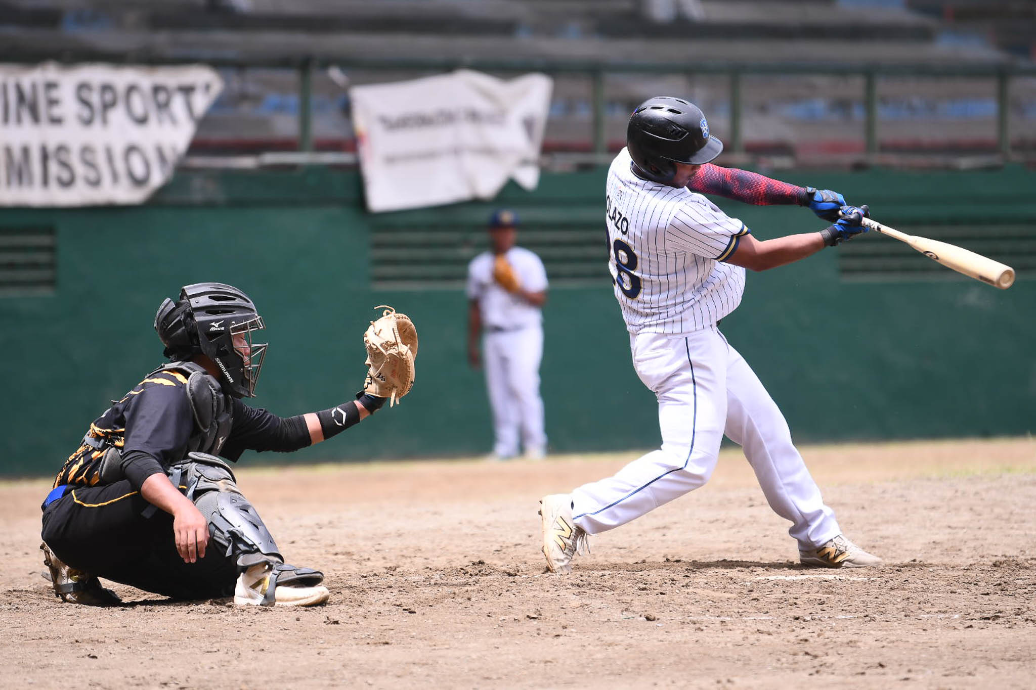 UAAP-Season-88-Baseball-UST-vs-NU-Olazo-2 NU fends off UST, stays unbeaten in UAAP Men's Baseball Baseball News NU UAAP UST - philippine sports news