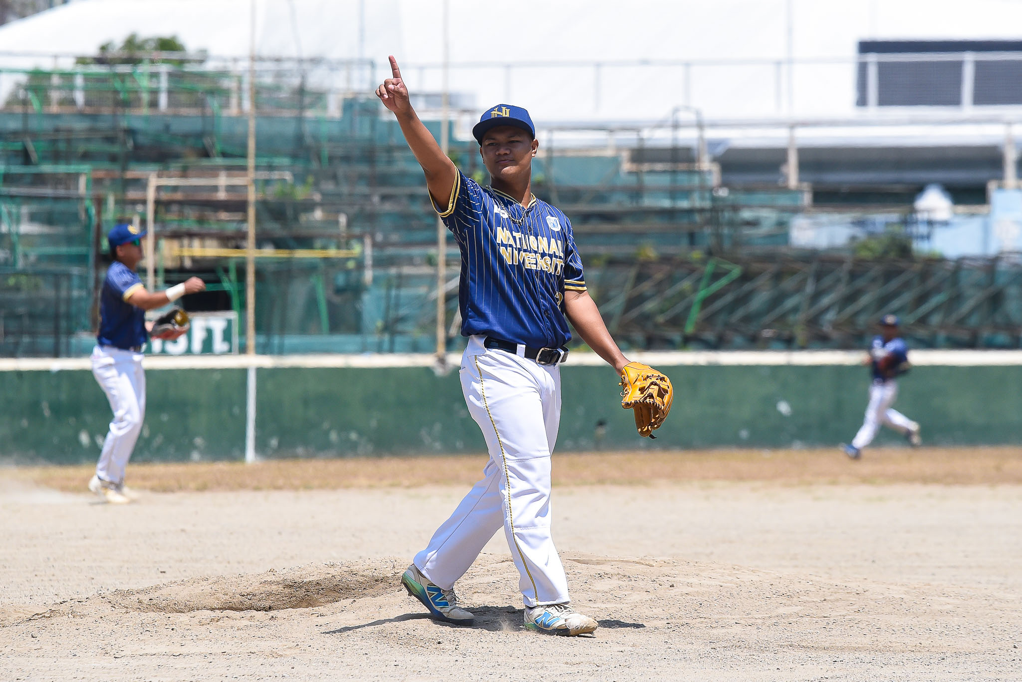 UAAP88-BASEBALL-ADU-vs-NU-ESPINA-III-HILARIO-M.-4495 NU rallies in fifth, downs Adamson to book UAAP Men's Baseball Final Four berth Uncategorized - philippine sports news