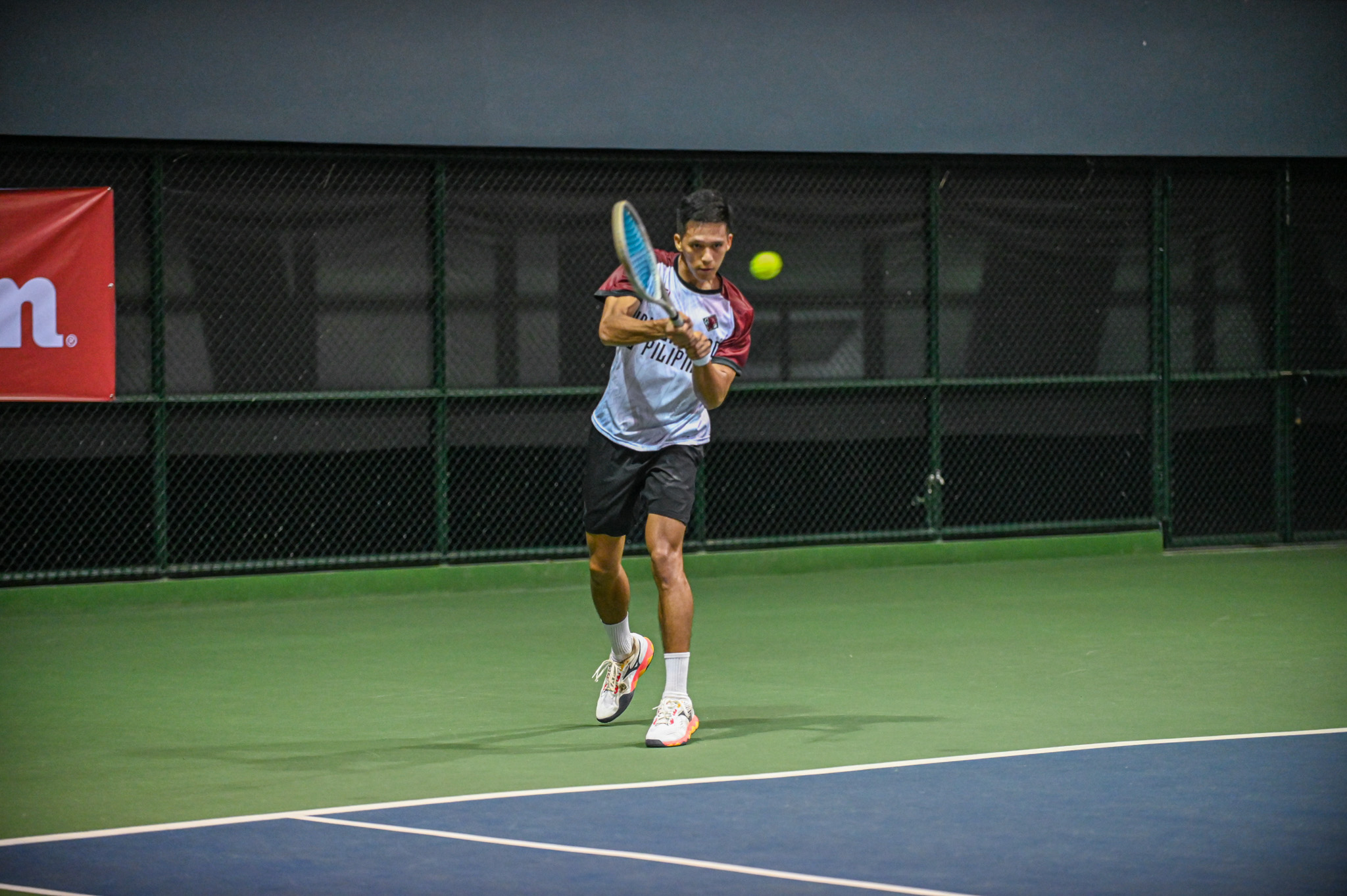 UAAP88-Tennis-Mens_-UP-vs-ADU_-UP_-FERNANDEZ-LOUCAS-9985 NU, UE secure remaining UAAP Men’s Tennis Final Four spots ADMU AdU DLSU News NU Tennis UAAP UE UP - philippine sports news