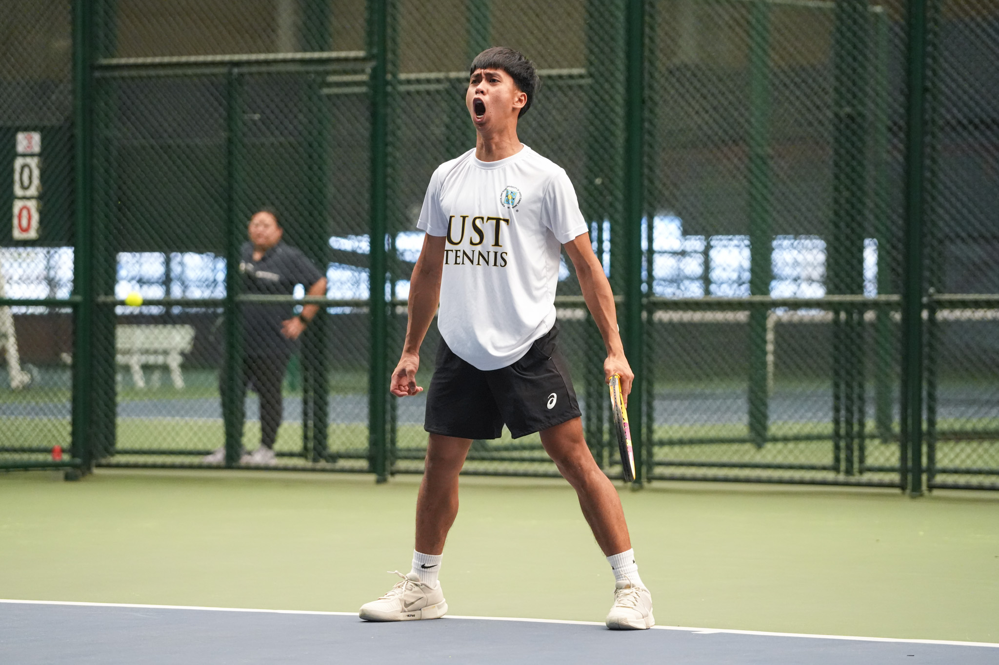 UAAP88-Tennis-Tournament-Mens-Finals_-TANGUB-Ericjay-01606 UST annexes 17th UAAP Men's Tennis title, ends UP's dream News Tennis UAAP Uncategorized UP UST - philippine sports news