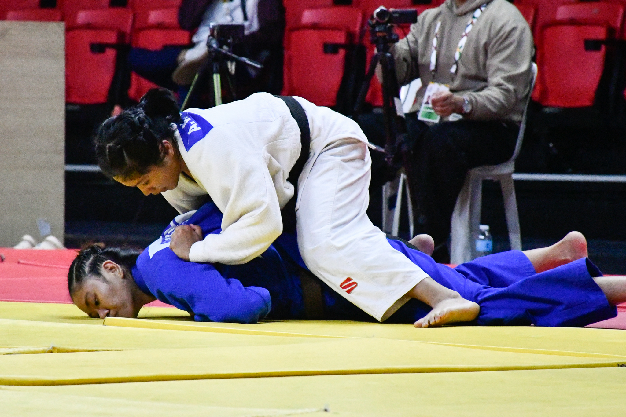 UAAP-88_Judo_Semis_UP-Caminero-vs-UST-Cortez-2 Chino Sy, Heart Rafael lead UST men, UE women surge in judo opener ADMU AdU DLSU Judo News UAAP UE UP UST - philippine sports news