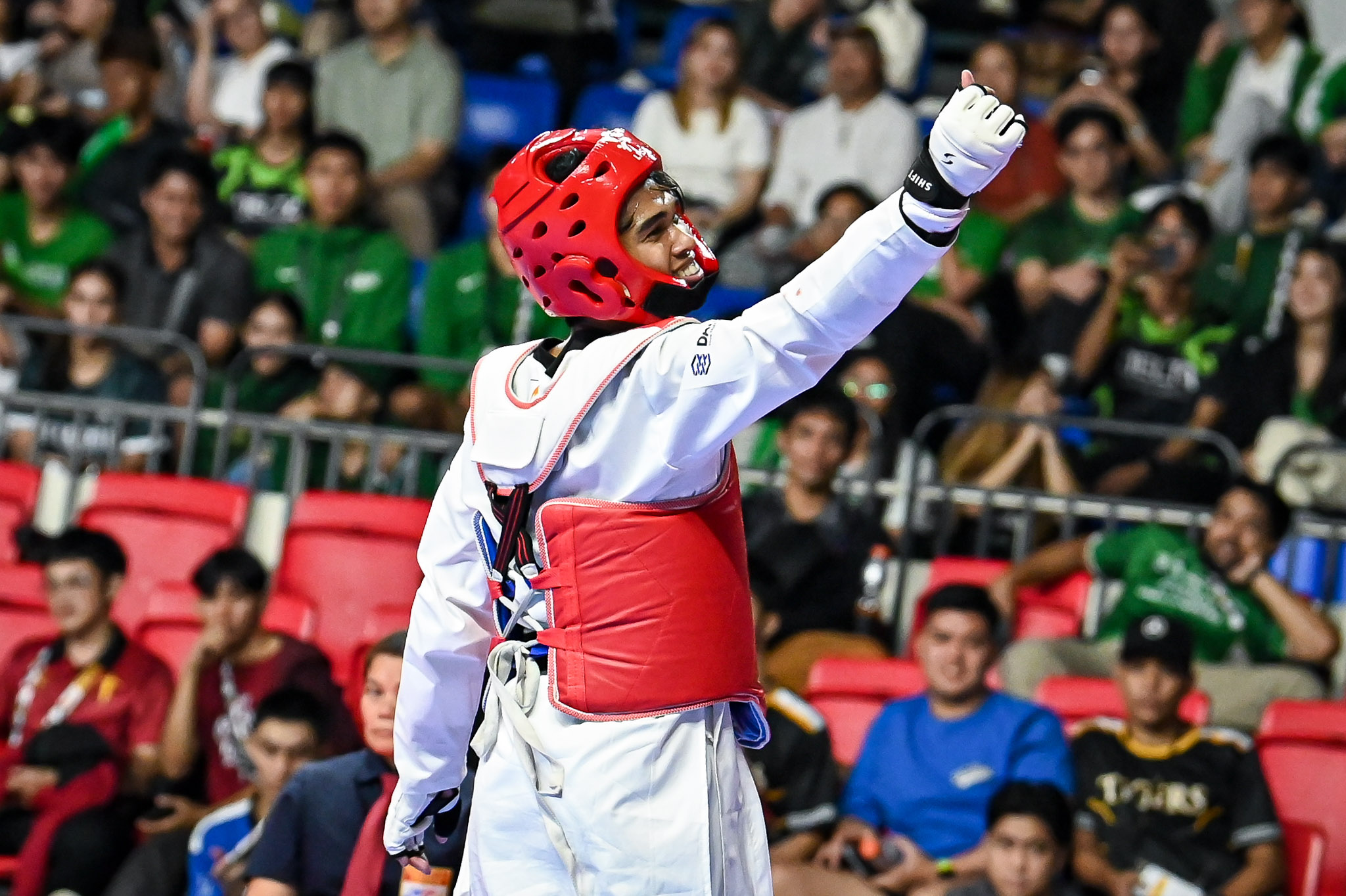 UAAP88-TKD-MEN-FLY-MELBOURNE-LUSTADO-8701 Nine Bulldogs storm to UAAP kyorugi finals in massive NU surge ADMU DLSU FEU News NU Taekwondo UAAP UP UST - philippine sports news