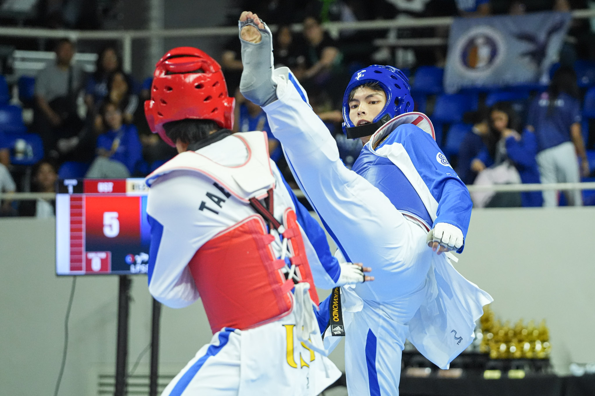 UAAP88-Taekwondo_-Mens_-BANTAM_-BUENAVIDES-Kenneth-03123 NU completes UAAP Collegiate Taerkwondo sweep with men’s, women’s kyorugi crowns News Taekwondo UAAP - philippine sports news
