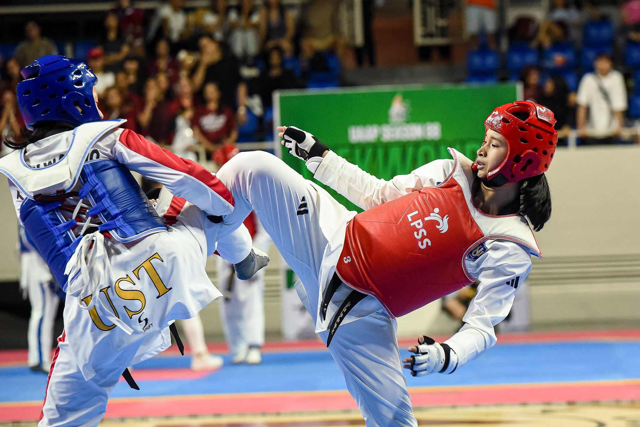 UAAP88-WOMENS-TKD-MID-HEAVY-MERICA-CHAN-2696 Nine Bulldogs storm to UAAP kyorugi finals in massive NU surge ADMU DLSU FEU News NU Taekwondo UAAP UP UST - philippine sports news