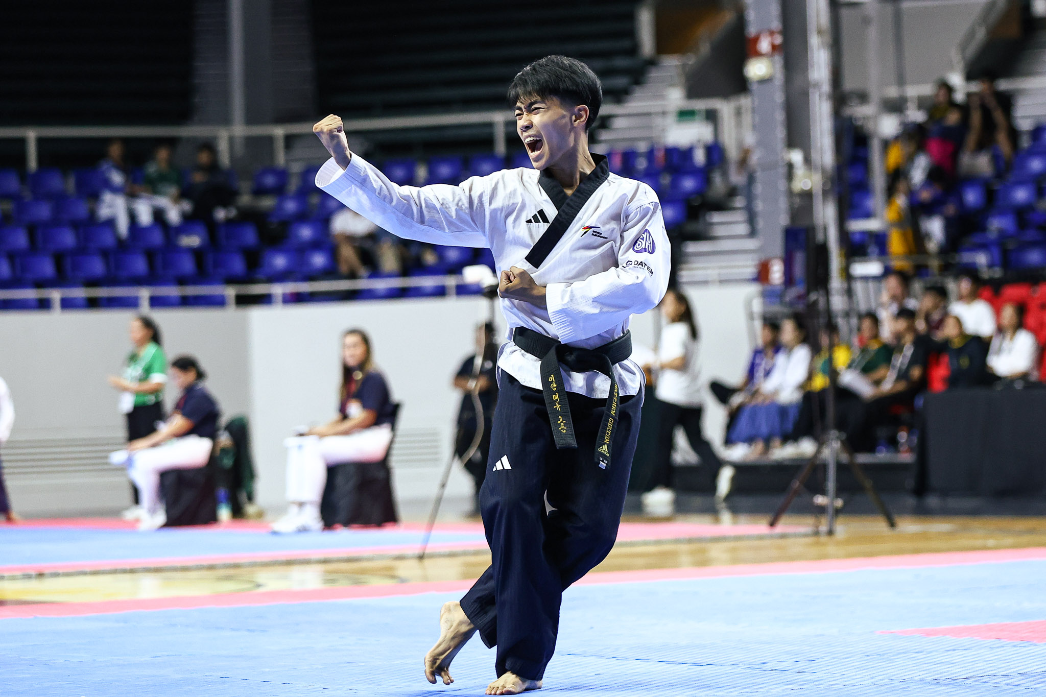 UAAPS88-Poomsae-Mens-CORTON-Ian-Matthew-5140 NU reclaims UAAP poomsae crown after 3 years, denies UST 'three-peat' bid ADMU DLSU FEU News NU Taekwondo UAAP UP UST - philippine sports news