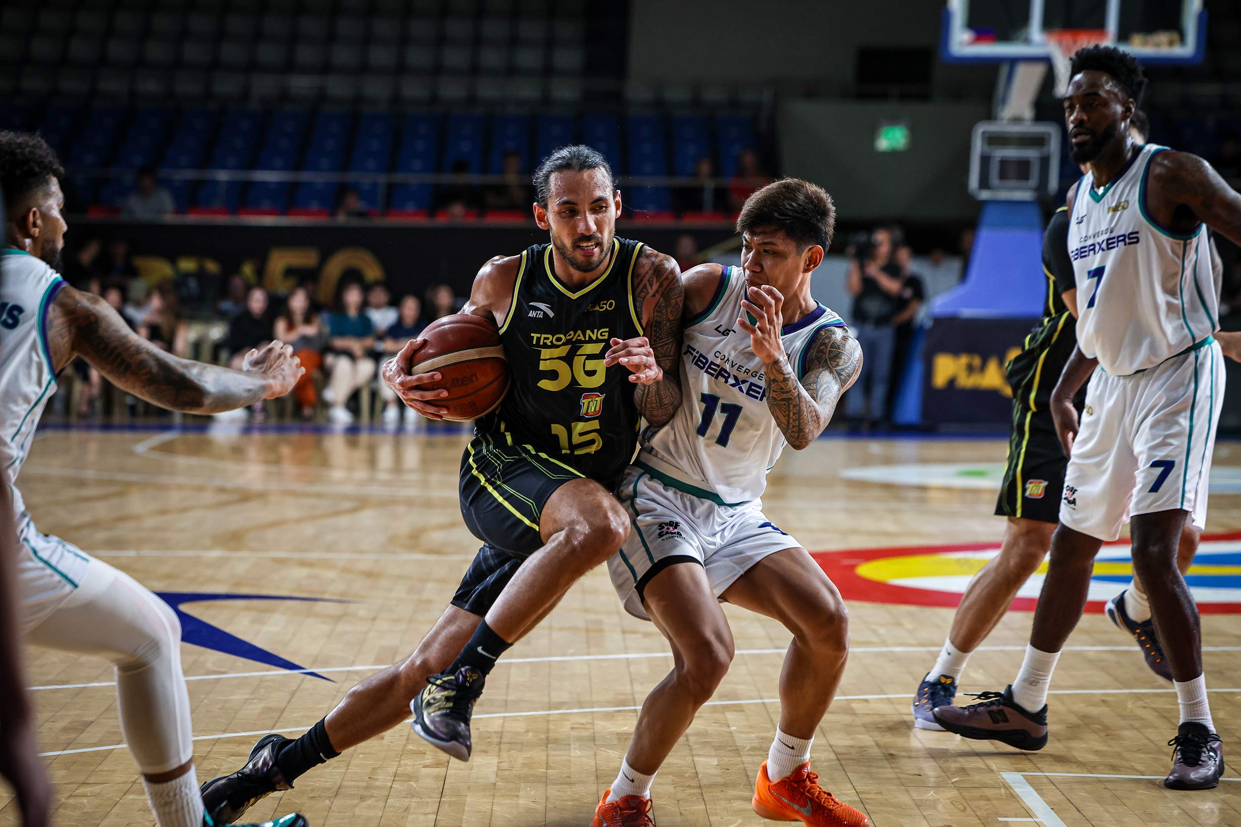2026-PBA-Governors-Cup-TNT-vs-Converge-Jordan-Heading PBA: Nambatac's buzzer-beating three rescues injury-hit TNT against Converge Basketball News PBA - philippine sports news
