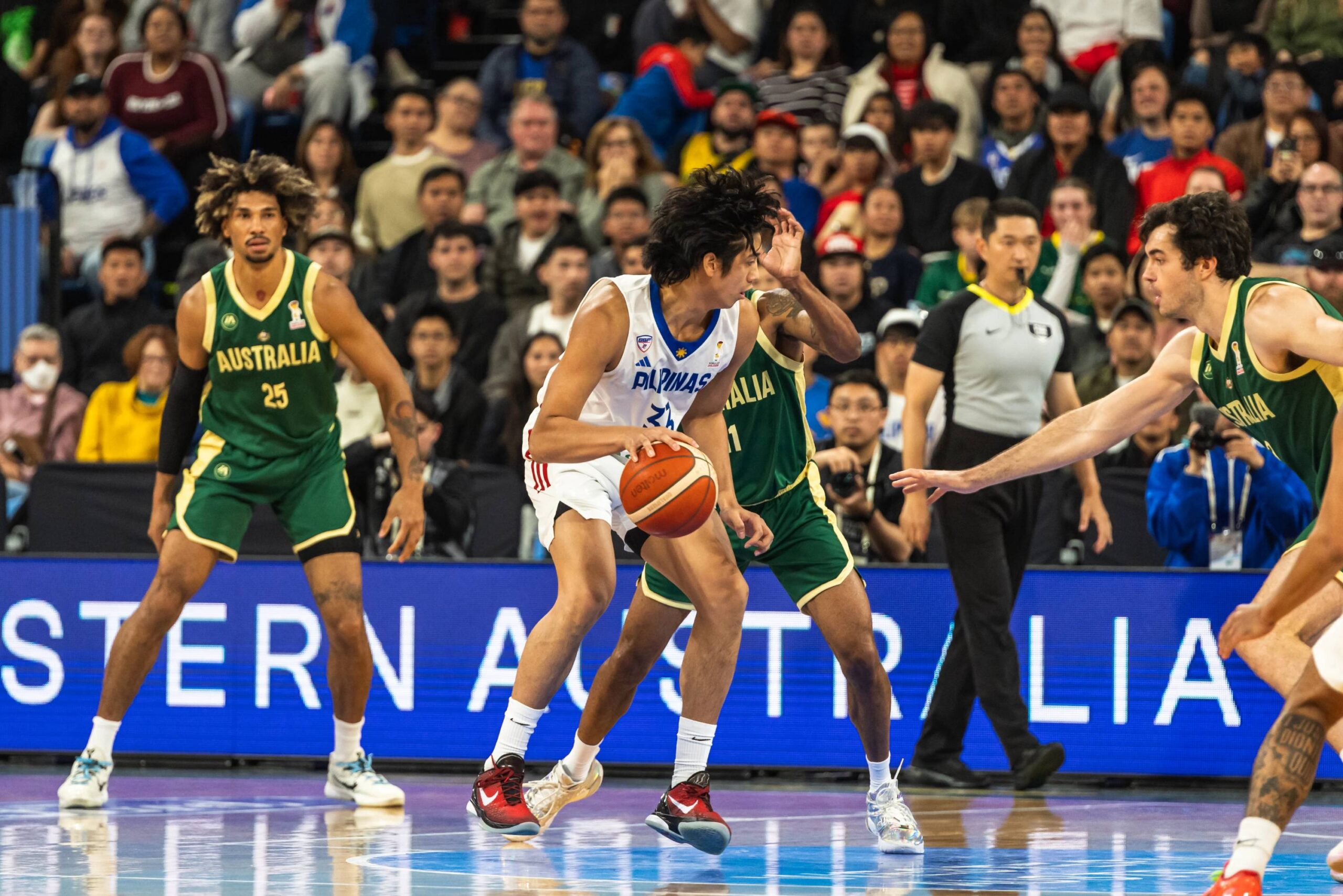 2027-FIBA-World-Cup-Qualifiers-Gilas-Men-vs-Australia-Carl-Tamayo-scaled Injury-plagued Gilas overwhelmed by Australia, enter World Cup Qualis Round 2 on four-game skid Basketball Gilas Pilipinas News  - philippine sports news