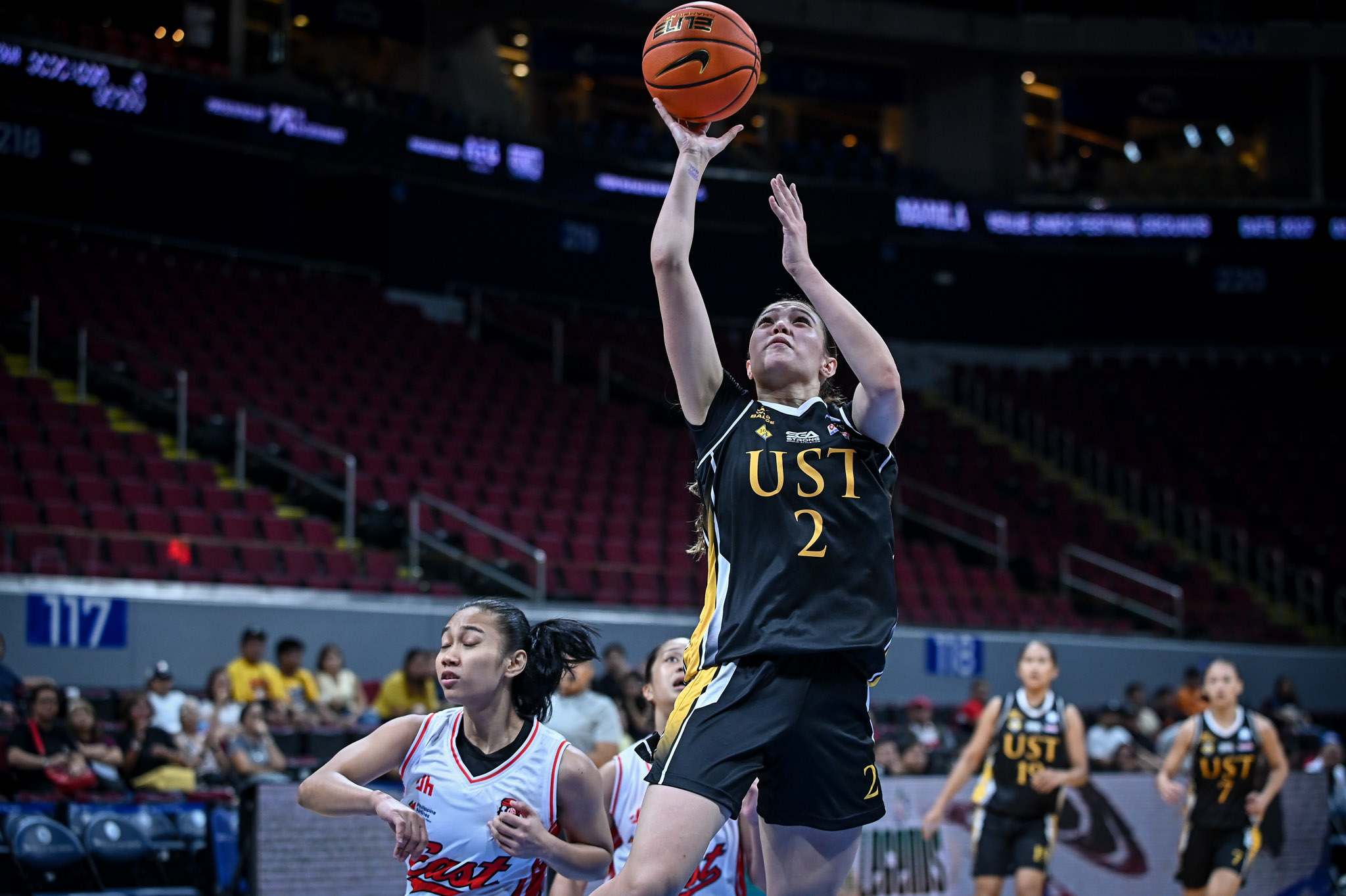 UAAP-89-WBB-UE-vs.-UST-Errin-Mcalary-9601 UST opens UAAP women's basketball title defense with rout of UE Basketball News UAAP UE UST  - philippine sports news