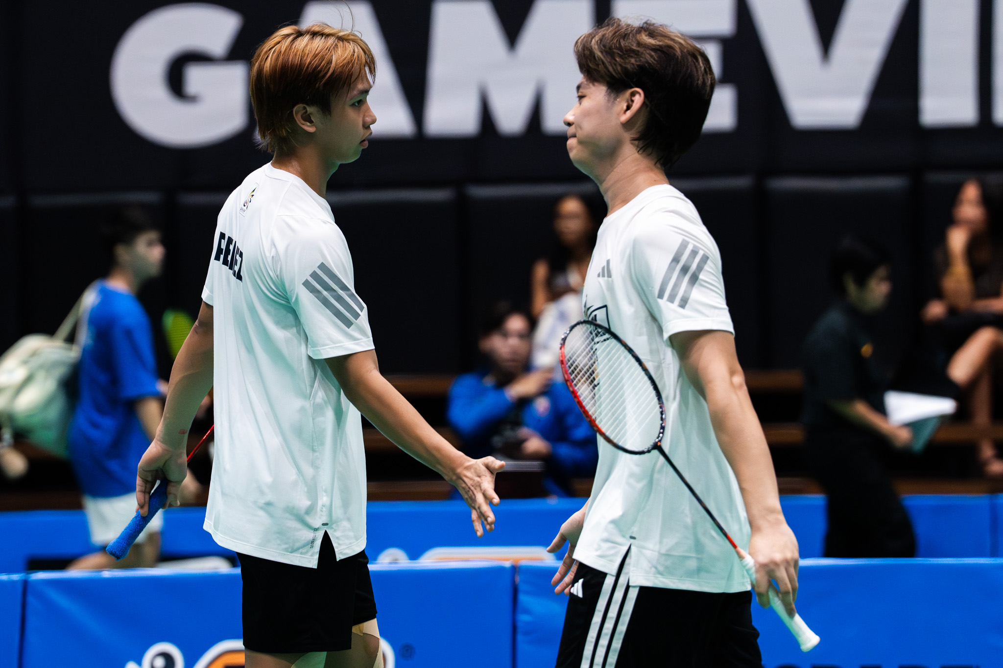 UAAP-89-BADMINTON-NU-VS.-UST-MARCJOEL-CLARENCE-B.-PEREZ-5 Villaflor headlines UAAP men's badminton singles quarterfinalists as NU shines in doubles ADMU AdU Badminton DLSU News NU UAAP UP UST  - philippine sports news
