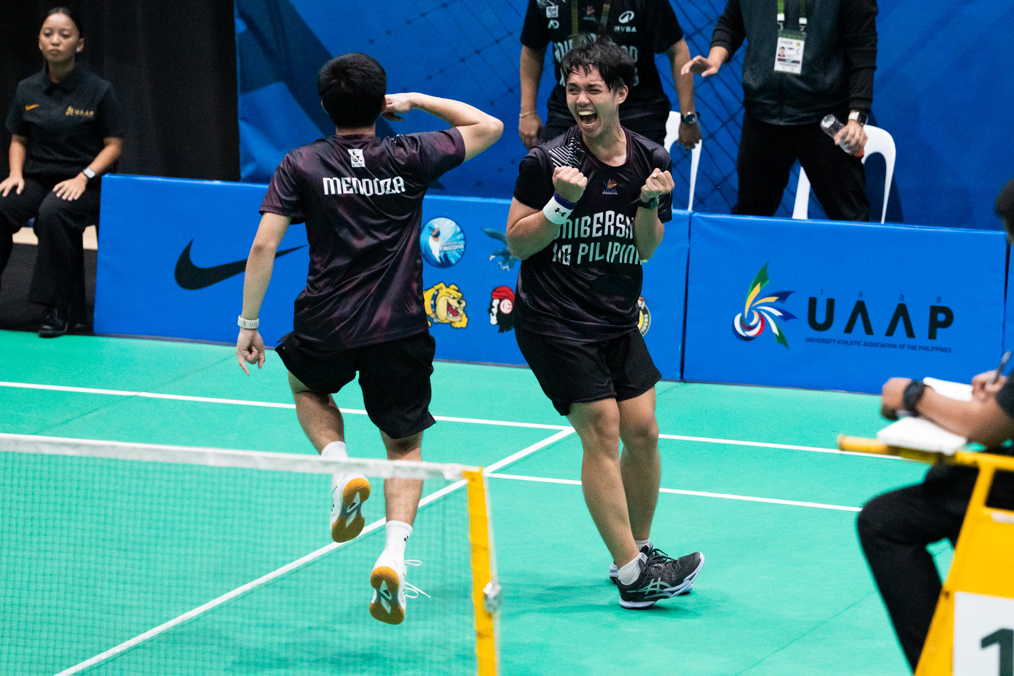 UAAP-89-BADMINTON-UP-VS.-UST-Arjay-Lazareto-Ryan-Mendoza Villaflor headlines UAAP men's badminton singles quarterfinalists as NU shines in doubles ADMU AdU Badminton DLSU News NU UAAP UP UST  - philippine sports news