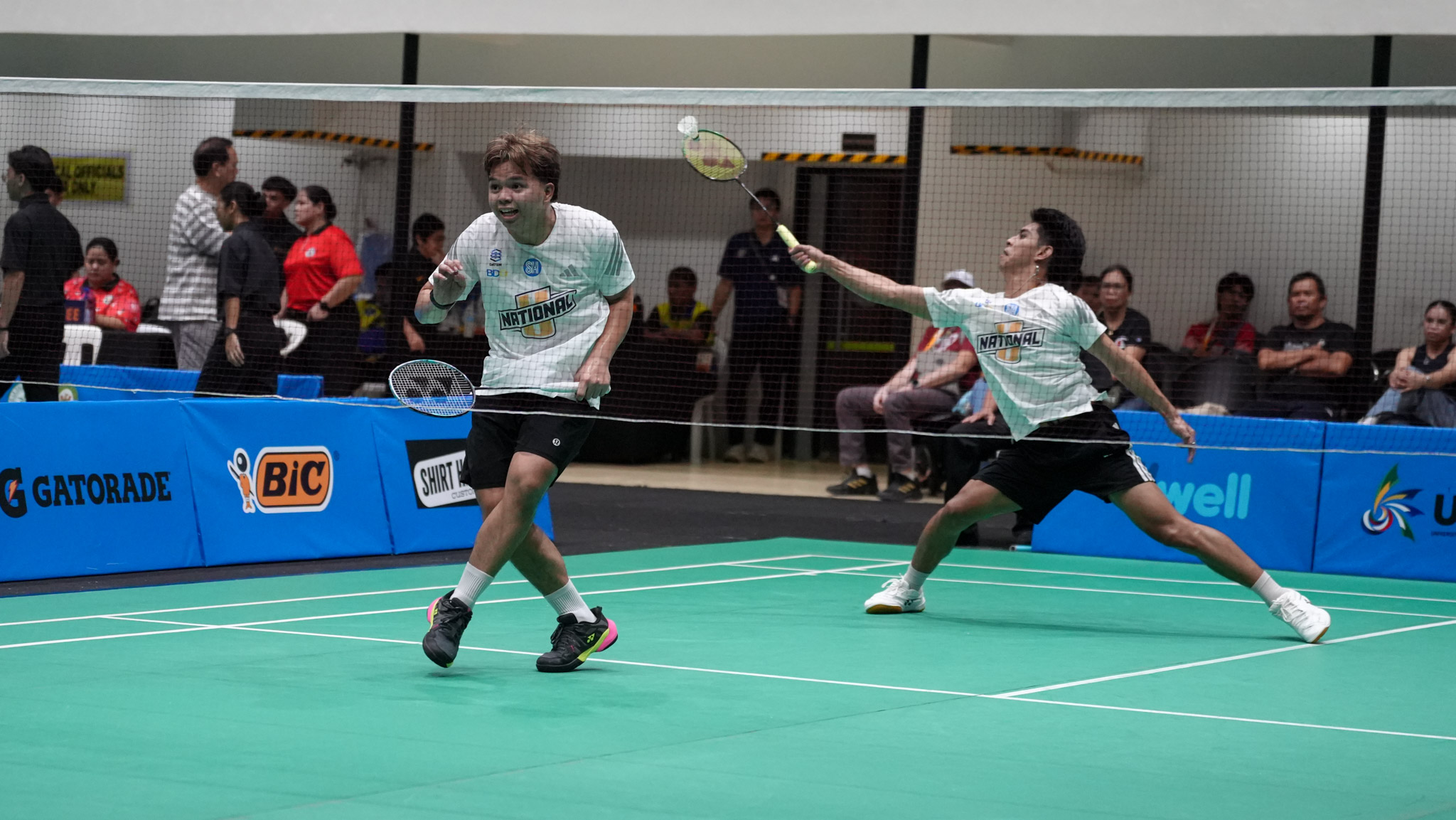 UAAP-89-Badminton-DLSU-vs-NU-John-Gam-4 Zafra, Villaflor power NU into UAAP men's badminton singles semifinals ADMU AdU Badminton DLSU News NU UAAP UP - philippine sports news