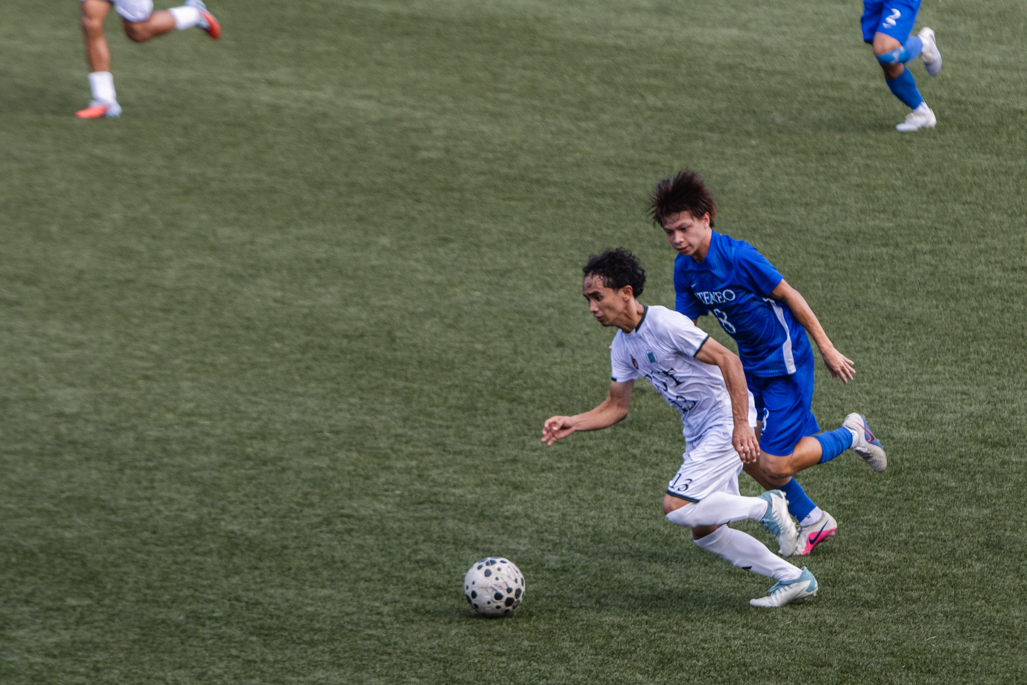 UAAP89-MFB-5392-Novie-Paraiso-Umi-Abelarde Ballespin shines as UST blanks Ateneo for first UAAP men's football win ADMU Football News UAAP UST - philippine sports news