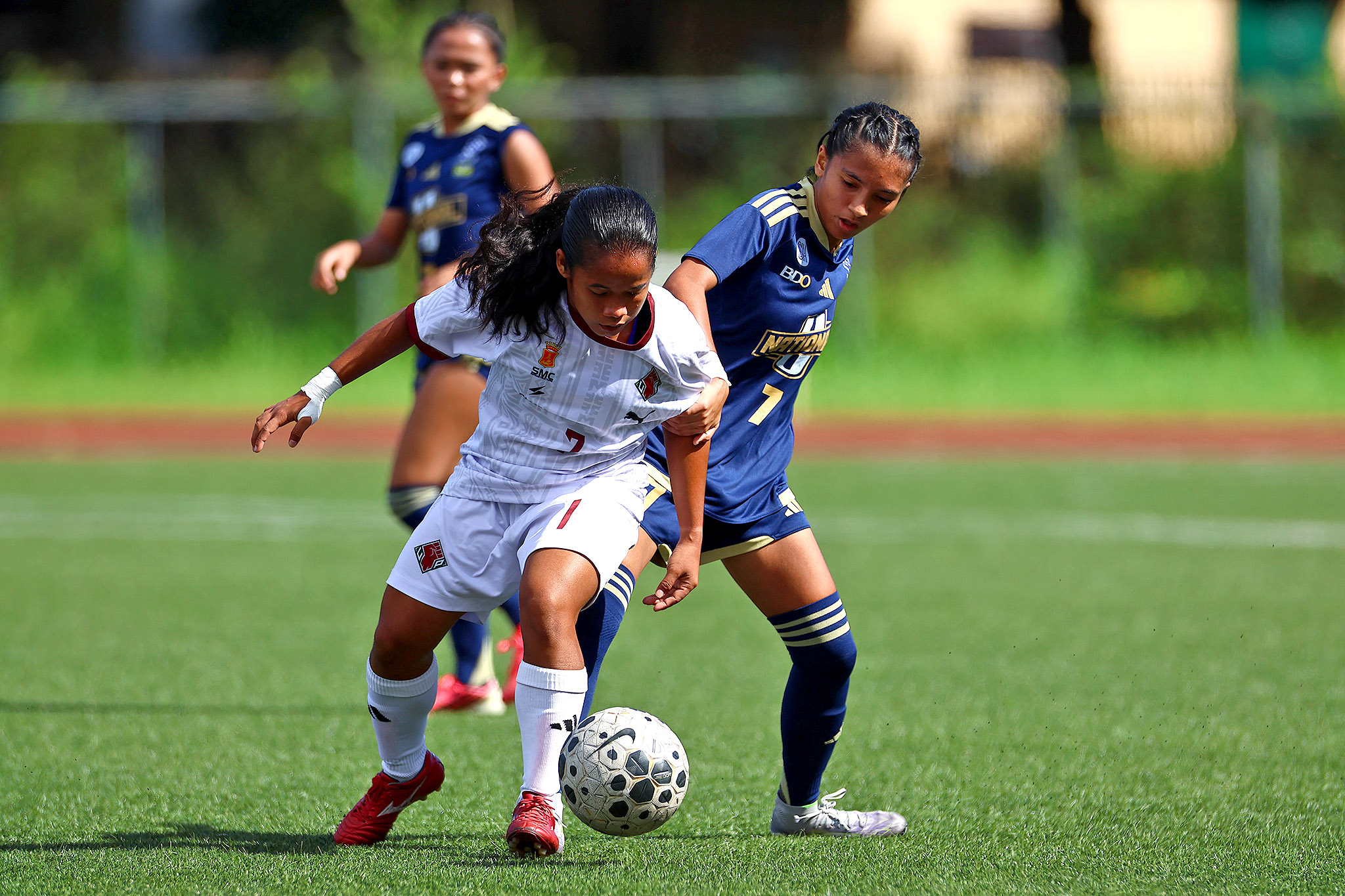 UAAP89-WFB-Chelsea-Maguad-Steffanie-Escalante UP sends NU to brink of elimination in UAAP women's football Football News NU UAAP UP - philippine sports news